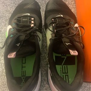 Nike metcon 7 womens size 11. Black white and green.